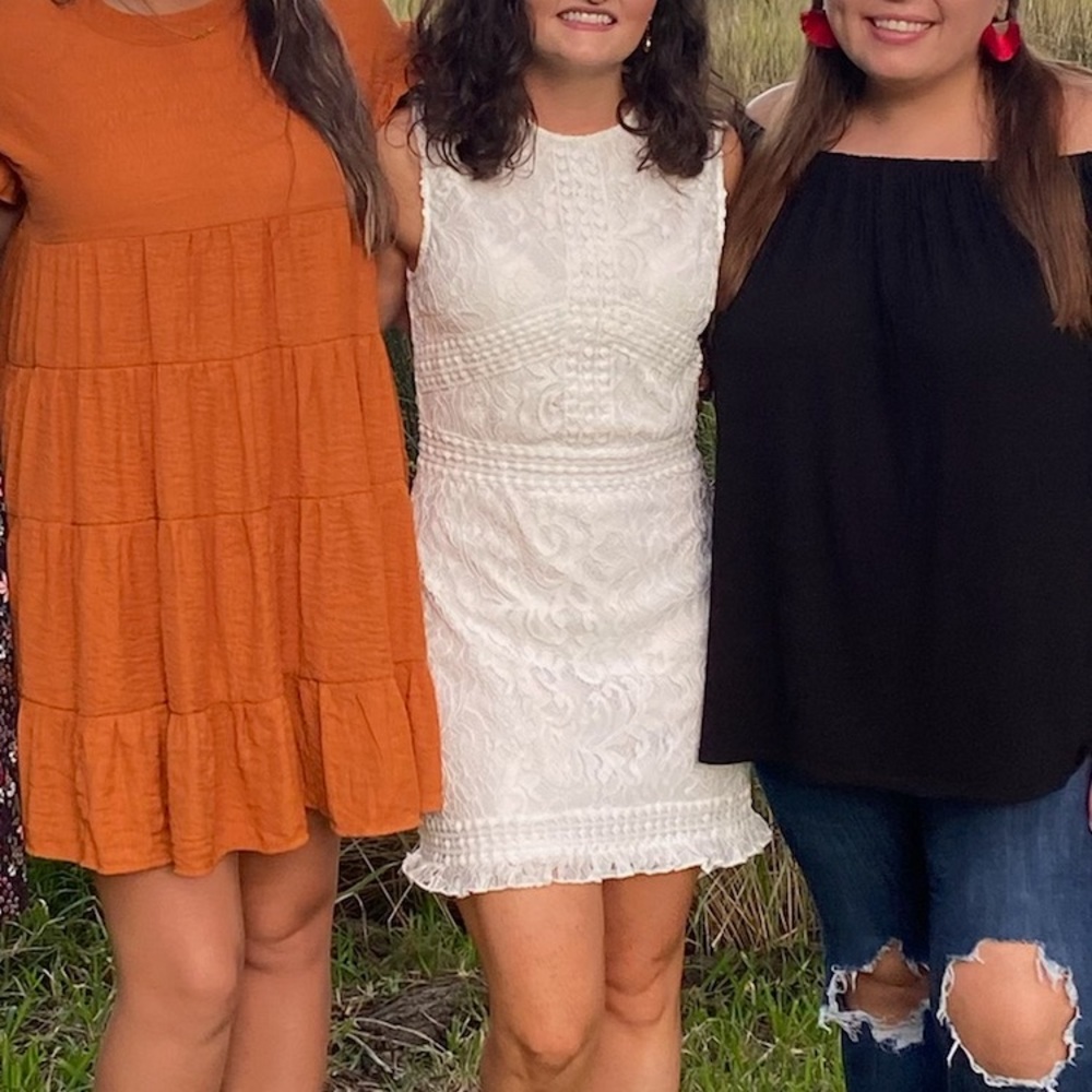 Knee length white lace dress
